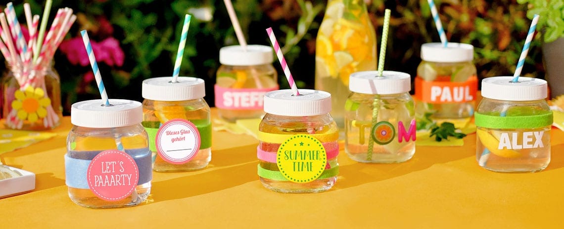 Theme party glasses with empty Nutella® jars