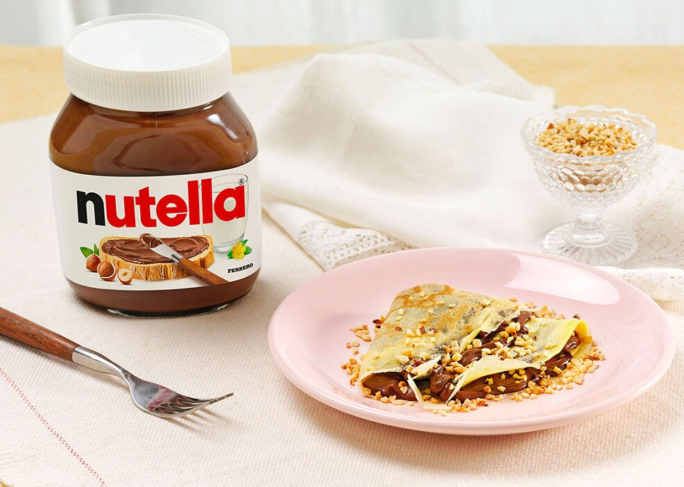 Crepes with Nutella® and hazelnuts