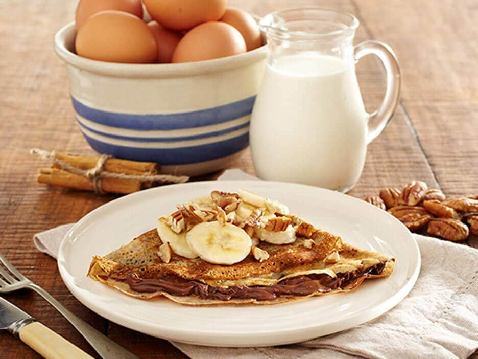 Cinnamon crepes with Nutella®, banana & pecans