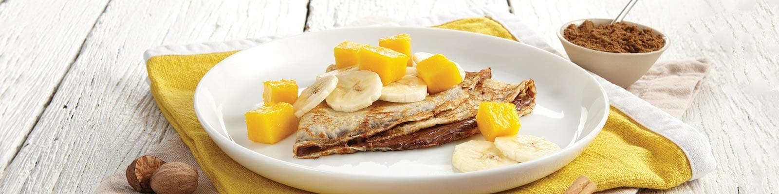 Mixed Spiced Crepe with Nutella® chocolate hazelnut spread, mango and banana