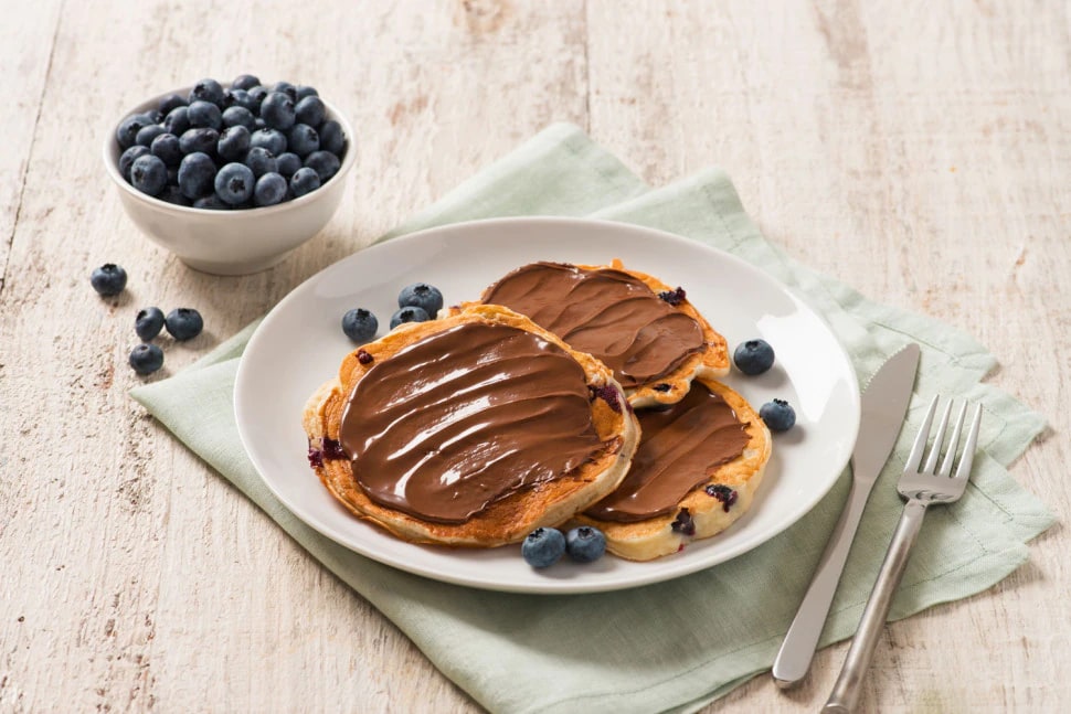 Mini Blueberry Buttermilk Pancakes with Nutella® chocolate hazelnut spread and strawberries